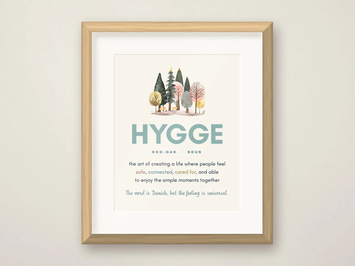The Hygge definition print in a honey oak frame